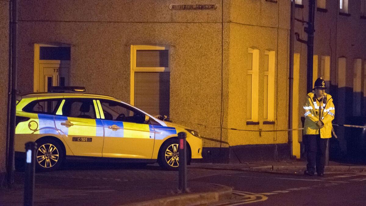 Police cordon off Jeffery Street in Newport, Wales, on Tuesday. Scotland Yard said that a 25-year-old man was arrested in Newport, the third arrest related to Friday's subway attack in Parsons Green.