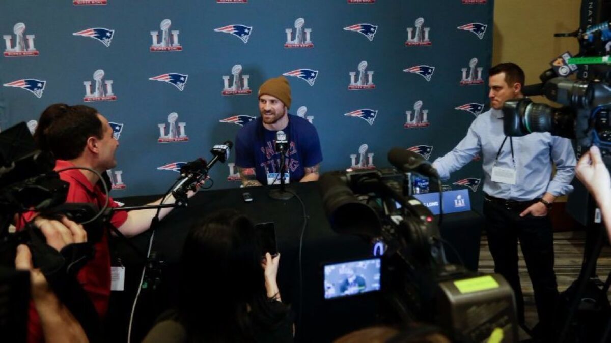 Patriots defensive end Chris Long answers questions during a news conference on Jan. 31.