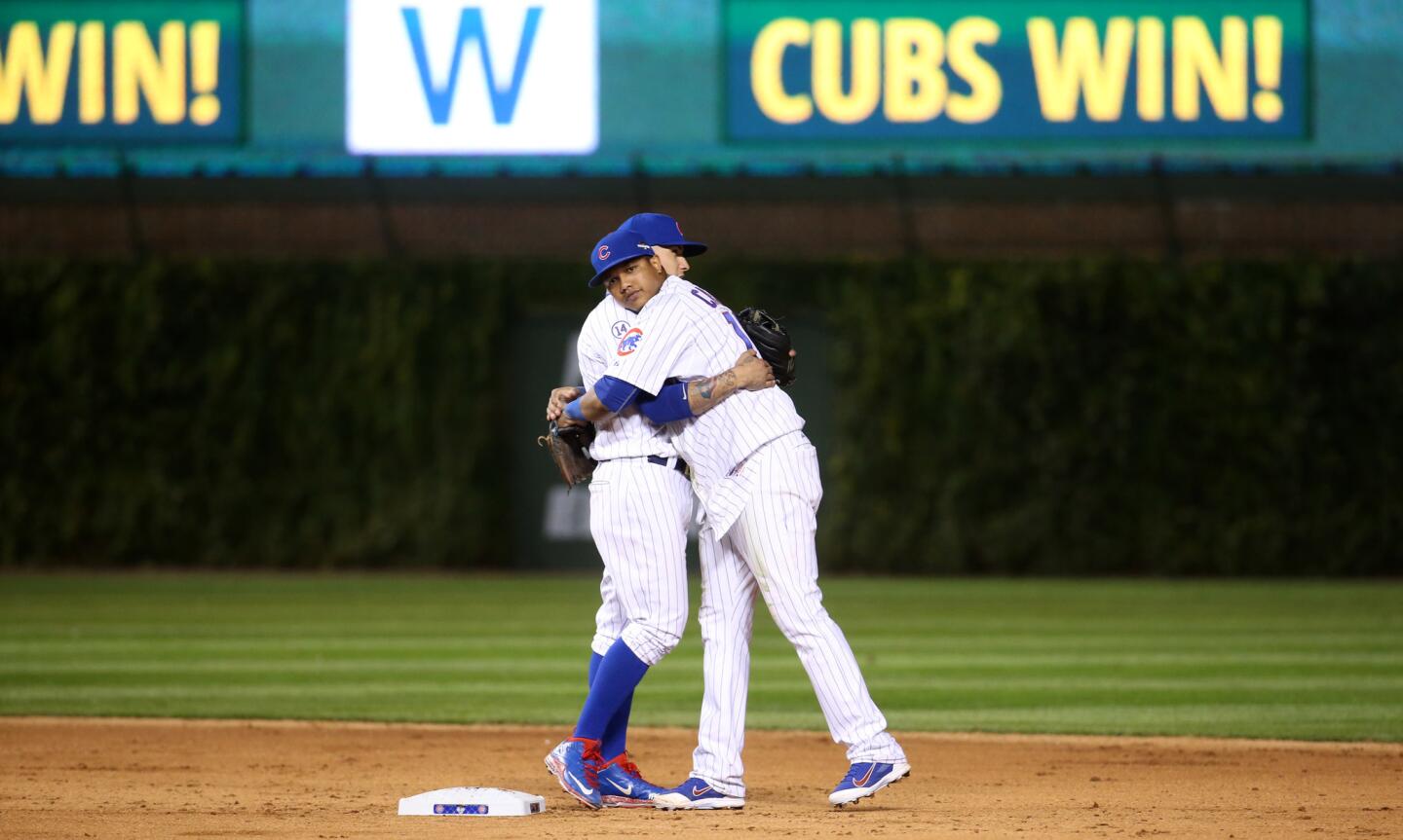 Javier Baez and Starlin Castro celebrate the Cubs winning Game 3 of the National League Division Series on Oct. 12, 2015, at Wrigley Field.