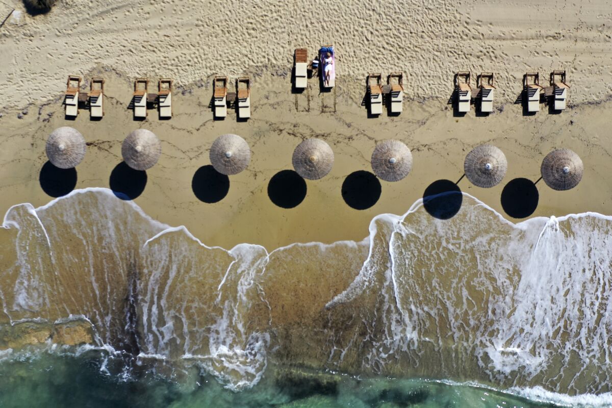 Aerial view of beachgoers in Greece