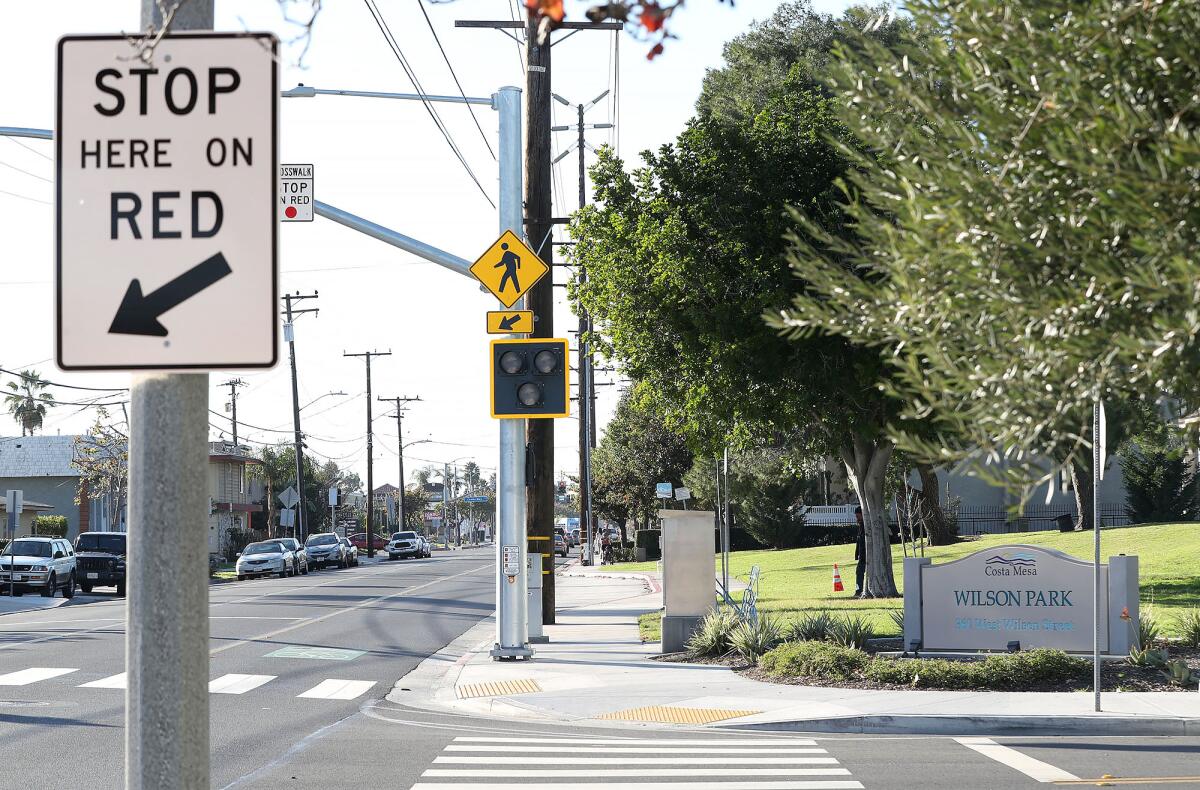 A newly installed traffic signal and signage on Costa Mesa's Wilson Street. 