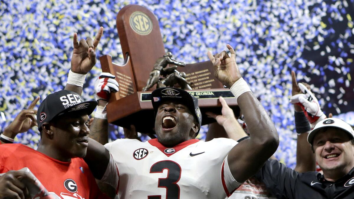 Roquan Smith (3) celebrates after Georgia defeated Auburn 28-7 in the Southeastern Conference championship game Dec. 2.