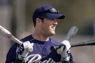 San Diego Padres' Sean Burroughs heads to the batting cage at spring training.