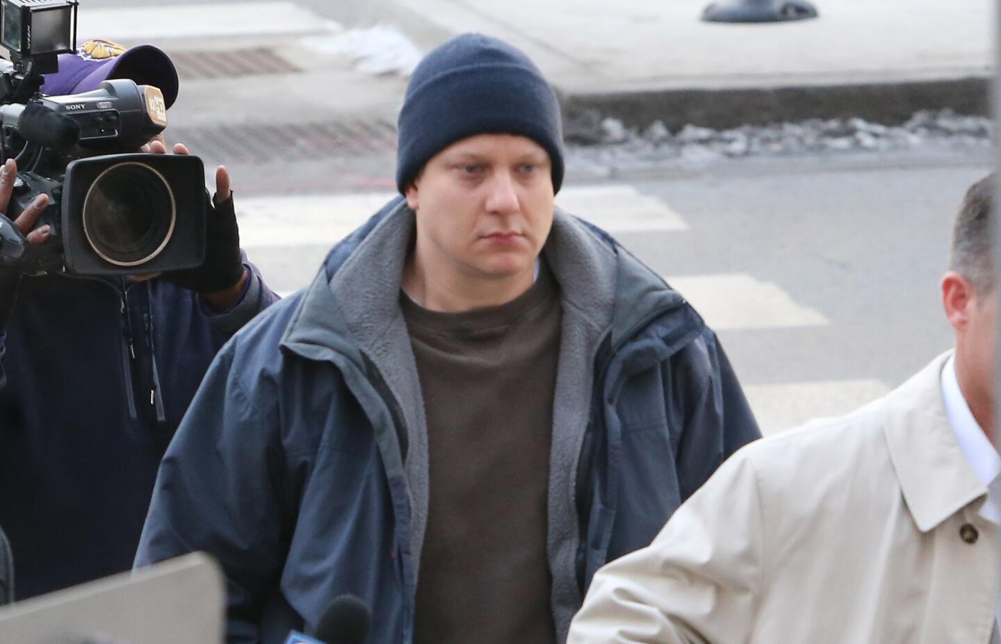 Chicago police Officer Jason Van Dyke arrives at the Leighton Criminal Court Building in Chicago on Nov. 24, 2015, to face charges in the shooting death of 17-year-old Laquan McDonald.