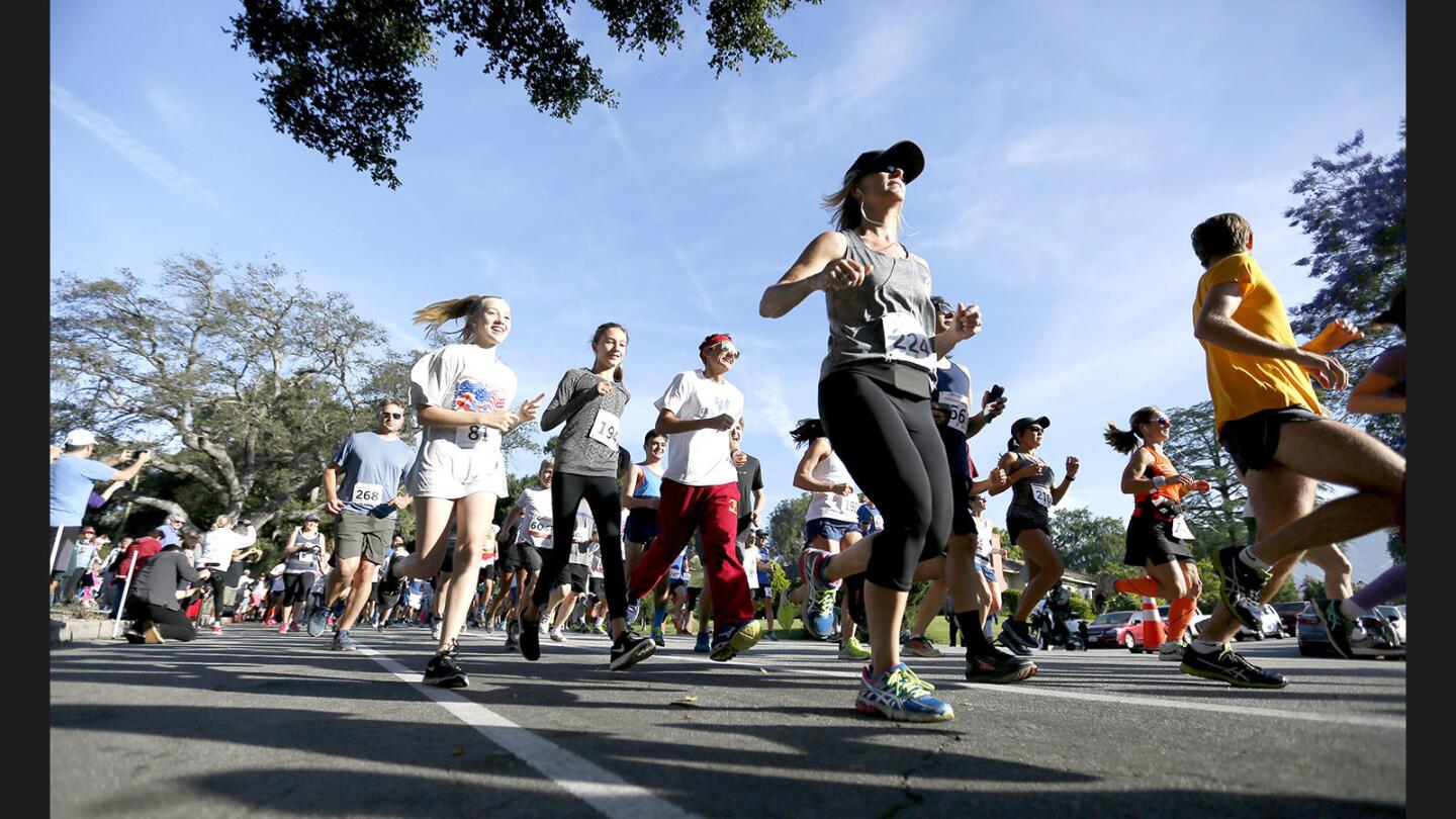 Runners begin the 5K and 10K runs at the annual YMCA of the Foothills Fiesta Days Run 5K, 10K and 1 mile family run/walk, at Descanso Gardens in La Cañada Flintridge on Monday, May 29, 2017.