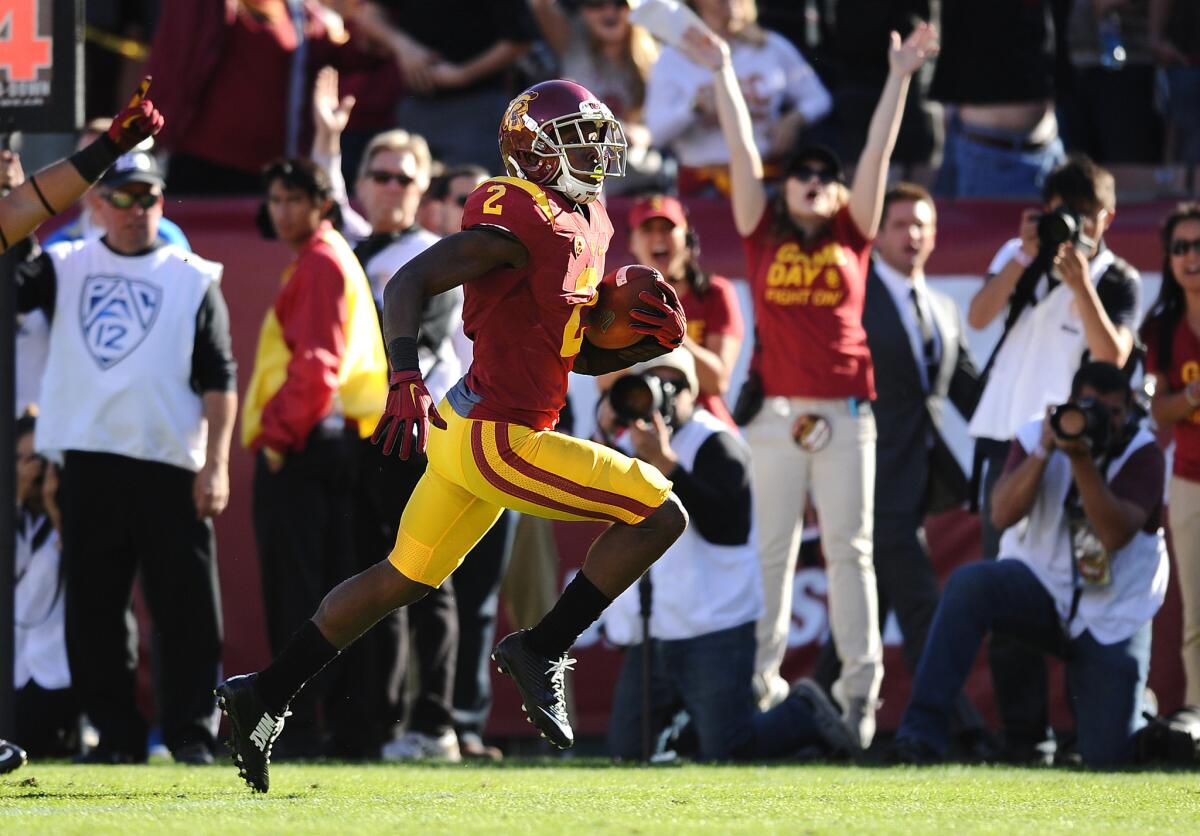 USC cornerback Adoree' Jackson returns a punt 42 yards for a touchdown against UCLA in the first half.