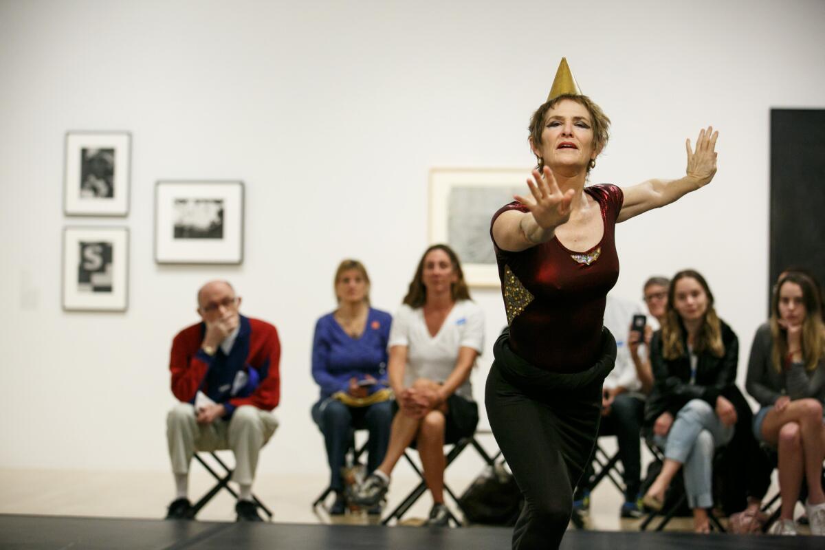 Polly Motley performs "Glyph," choreographed by dancer and teacher Katherine Litz at Black Mountain College in 1951, to Lou Harrison's score "The Glyph," at the Hammer Museum on March 18, 2016.