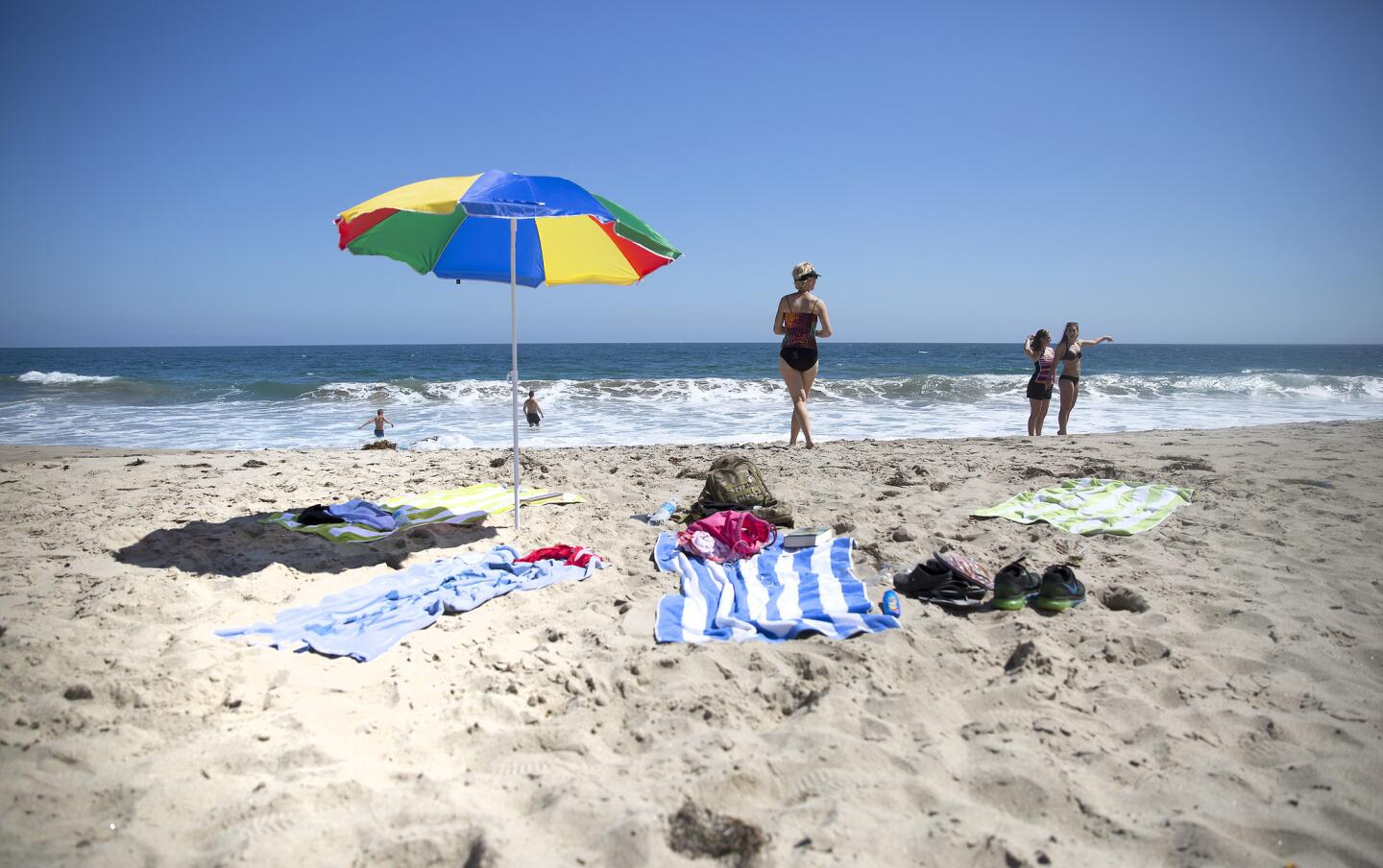 Beachgoers enjoy Carbon Beach in Malibu on June 24.