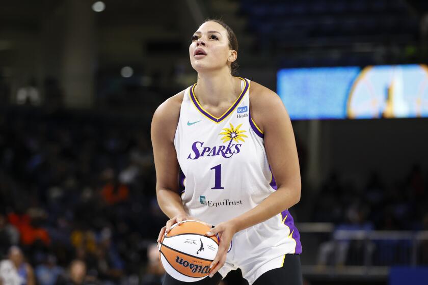 Los Angeles Sparks center Liz Cambage shoots a free throw against the Chicago Sky during the first half of the WNBA basketball game, Friday, May 6, 2022, in Chicago. (AP Photo/Kamil Krzaczynski)
