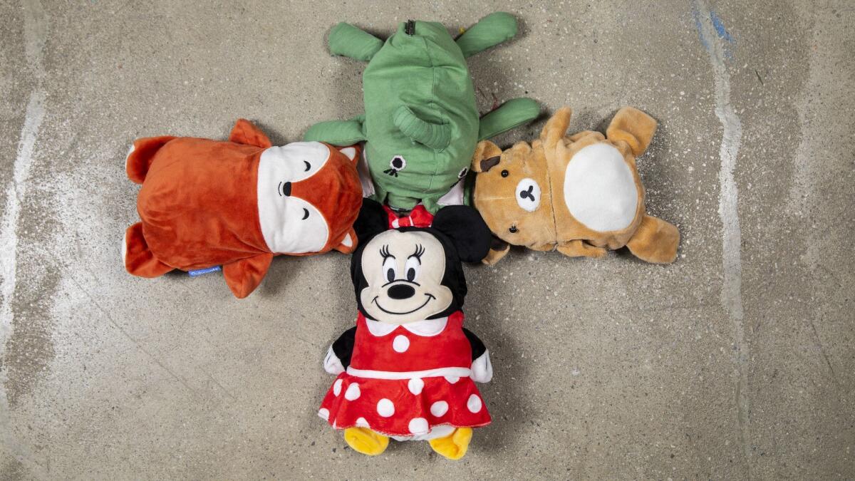 A selection of Cubcoats, stuffed animals that can be unfolded to become children's hoodies.