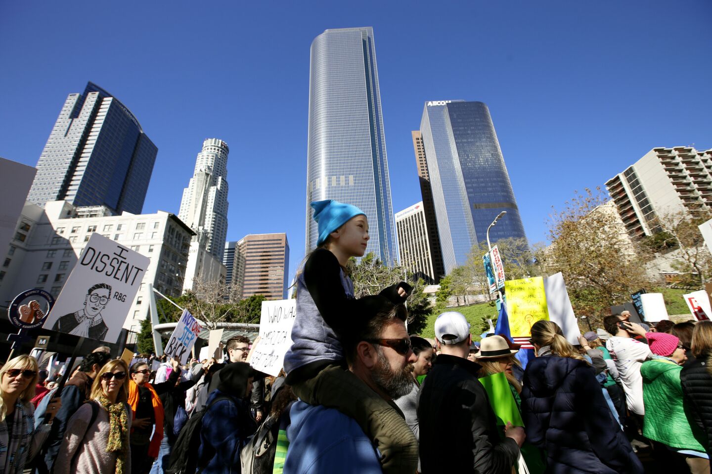 Many people walked with their children during the the march for women's rights in Los Angeles on Saturday.