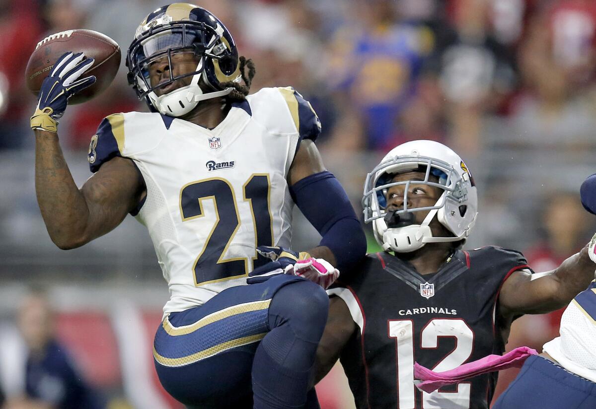 Rams cornerback Janoris Jenkins intercepts a pass intended for Cardinals wide receiver John Brown during a game on Glendale, Ariz., on Oct. 4, 2015.