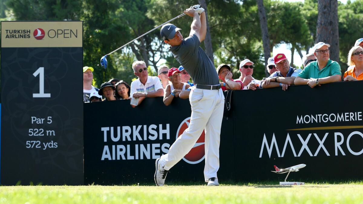 Rory McIlroy tees off to begin the third round of the Turkish Airlines Open on Saturday.