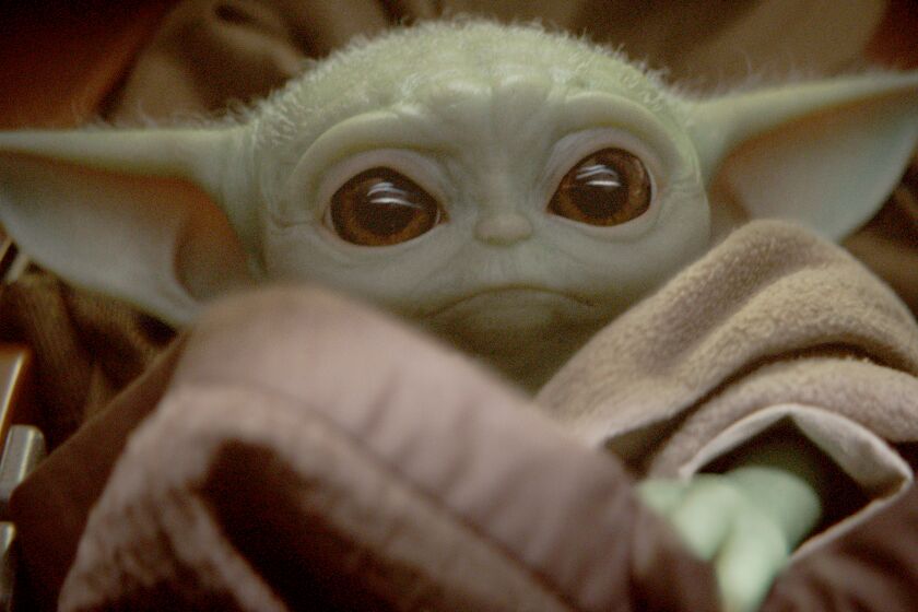 Baby Yoda is known simply as "the Child" in "The Mandalorian," the first live-action "Star Wars" series. MUST CREDIT: Disney Plus ** Usable by LA, BS, CT, DP, FL, HC, MC, OS, SD, CGT and CCT **