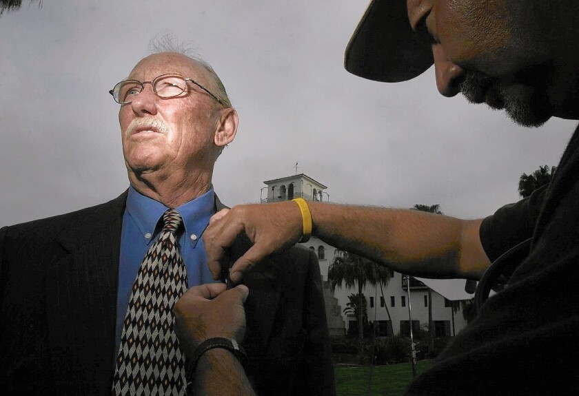 Santa Barbara County Dist. Atty. Tom Sneddon is shown outside the courthouse in 2005 after a Santa Maria jury acquitted pop star Michael Jackson on child molestation charges. Sneddon died Saturday at the age of 73.