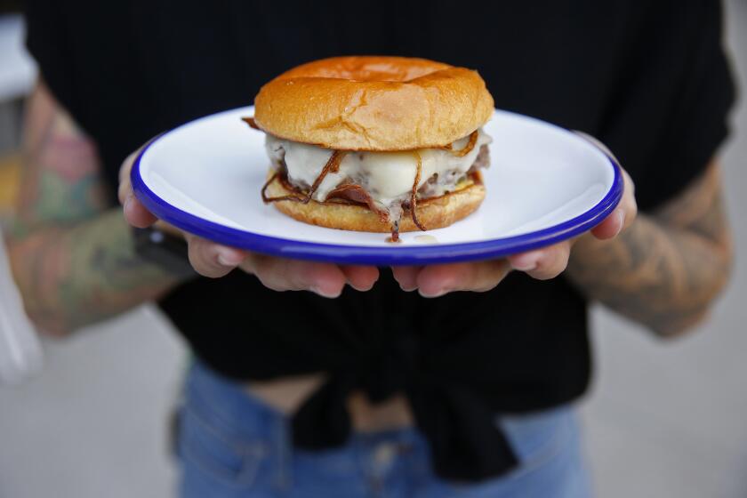 LOS ANGELES, CA - AUGUST 29, 2019 A cheeseburger lunch offering at the cafe Go Get Em Tiger located at The ROW on 777 South Alameda St. in Los Angeles operated by owners Kyle Glanville and Charles Babinski on August 29, 2019.(Al Seib / Los Angeles Times)