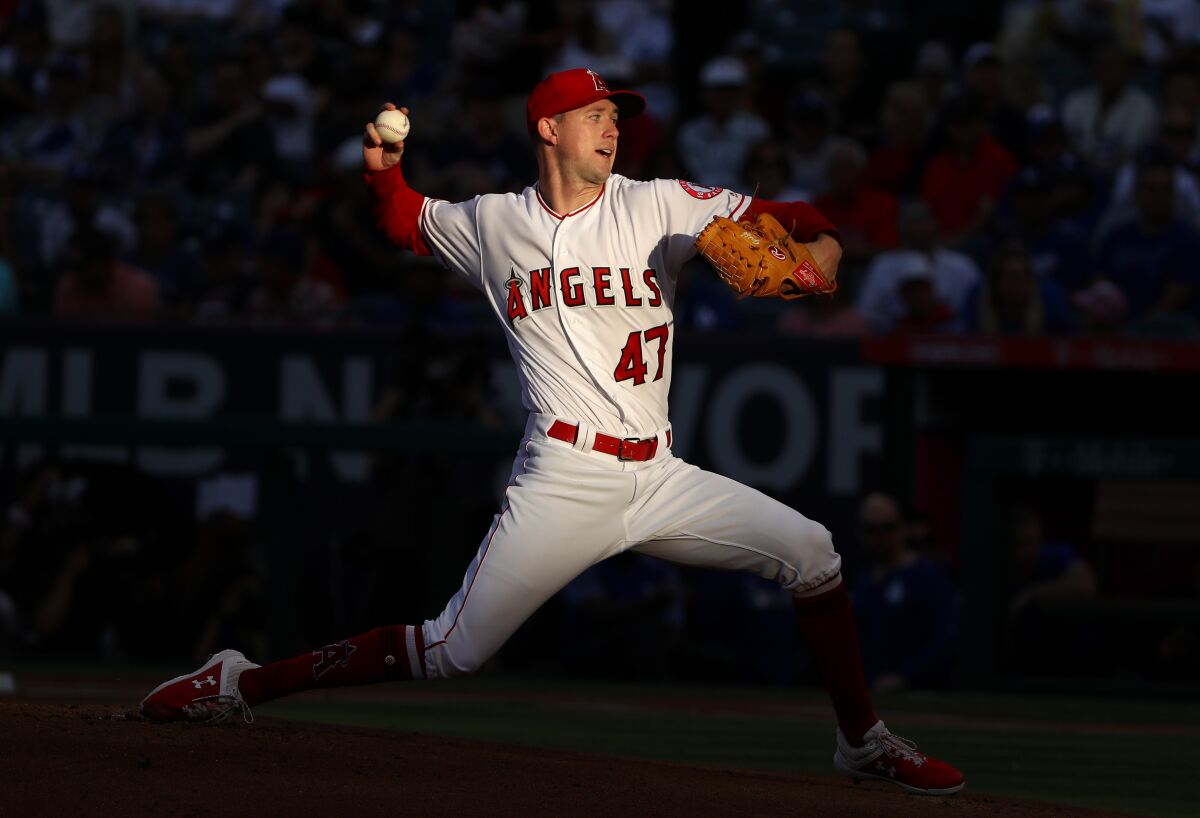 Angels pitcher Griffin Canning delivers during a game against the Dodgers in June 2019.