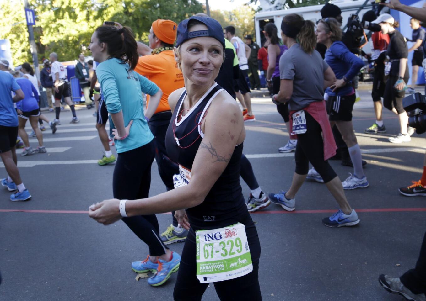 Pamela Anderson completes N.Y. marathon with sense of humor intact