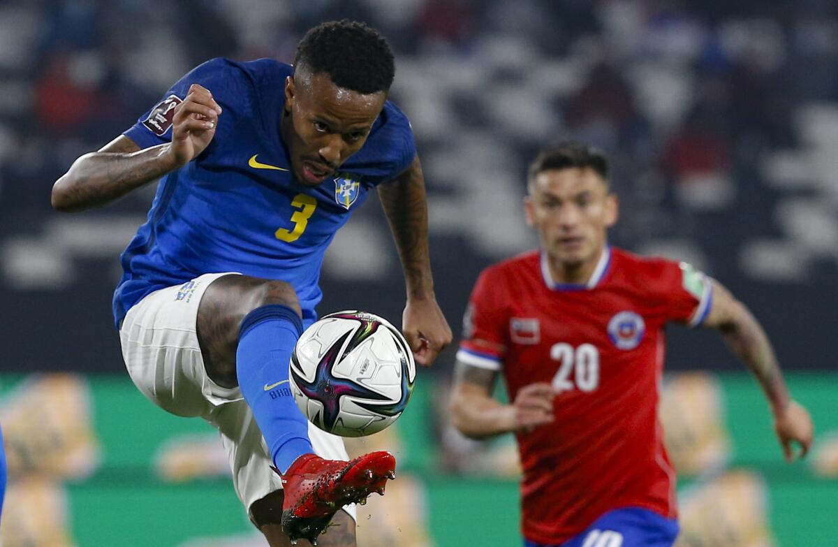 Brazil's Eder Militao controls the ball during a qualifying soccer match for the FIFA World Cup Qatar 2022 against Chile at Monumental Stadium in Santiago, Chile, Thursday, Sept. 2, 2021. (Claudio Reyes/Pool via AP)