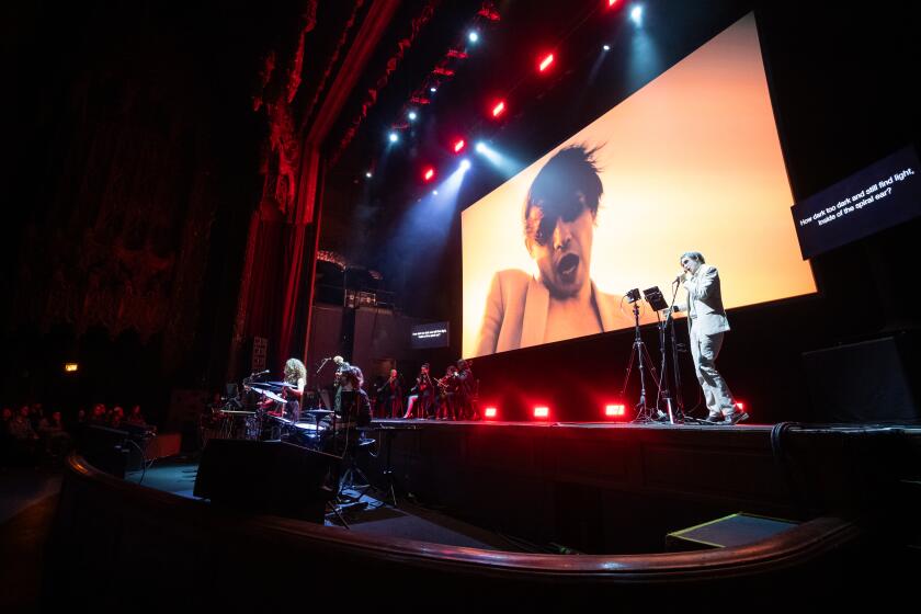 Timur Bekbosunov performing in David T. Little's "Black Lodge" at The United Theater on Broadway Saturday.