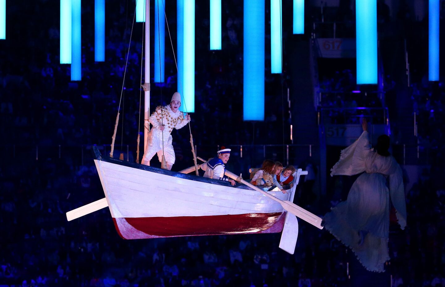Performers in an elevated boat during the 2014 Sochi Winter Olympics Closing Ceremony at Fisht Olympic Stadium in Sochi, Russia.