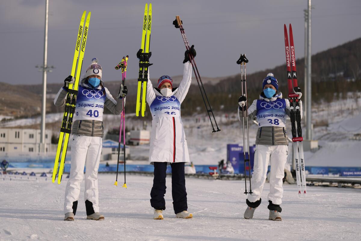 From left, silver medalist Kerttu Niskanen, gold medalist Therese Johaug and bronze medalist Krista Parmakoski