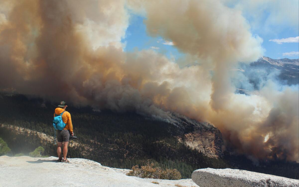 Smoke from the Meadow fire burning in high-elevation areas of Yosemite National Park rises above Little Yosemite Valley on Sunday.