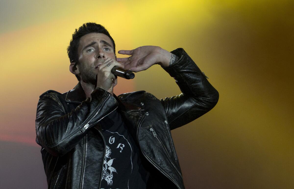 Adam Levine of Maroon 5 performs at the Rock in Rio music festival in Rio de Janeiro, Brazil. Big Boi and Travis Scott will join Maroon 5 in this year’s Super Bowl halftime show. Maroon 5 had been the widely reported halftime show act since September, but the NFL officially announced the band as its headliner Sunday, Jan. 13, 2019.