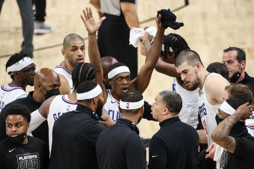Tuesday, June 22, 2021, Phoenix, Arizona - LA Clippers guard Rajon Rondo (4) vehemently reminds his teammates to raise their hands on defense before losing to Phoenix on an alley-oop dunk with less than a second left in Game two of the NBA Western Conference Finals at Phoenix Suns Arena. (Robert Gauthier/Los Angeles Times)