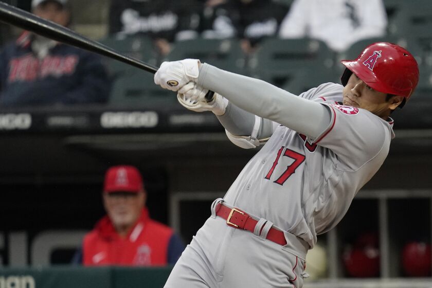 Los Angeles Angels' Shohei Ohtani, of Japan, hits a solo home run during the first inning.