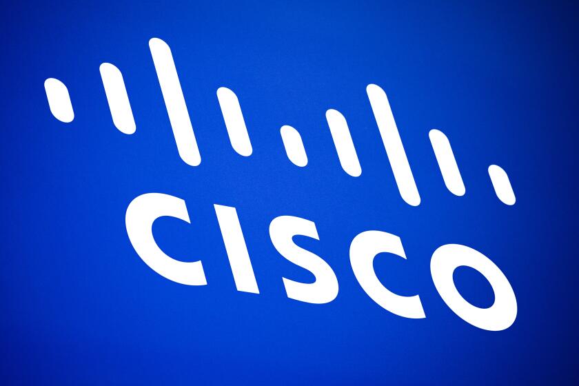 FILE - This March 2, 2023 file photo shows Cisco logo in the Mobile World Congress 2023 in Barcelona, Spain. Silicon Valley tech giant Cisco is buying cybersecurity firm Splunk, Thursday, Sept. 21, in a $28 billion deal as it looks to keep up with potential security threats that could be brought about by the increasing use of artificial intelligence. (AP Photo/Joan Mateu Parra)