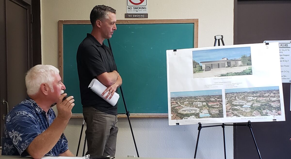 Applicant’s representative Scott Huntsman (standing) discusses the Morgan Residence project at 8441 Whale Watch Way during the La Jolla Shores Permit Review Committee meeting Oct. 21 at the Rec Center.