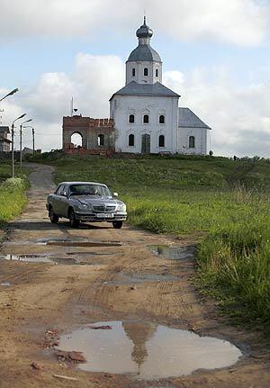 The quality of roads in many cities and towns across Russia is often even worse than that of Russian highways. A street is pictured in the town of Suzdal, a Russian historical architecture landmark in the Vladimir region.