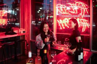 Camly Nguyen smiles in between sipping Jeremie Hutchet Pet Nat alongside Jenevieve Heo at Red Room.