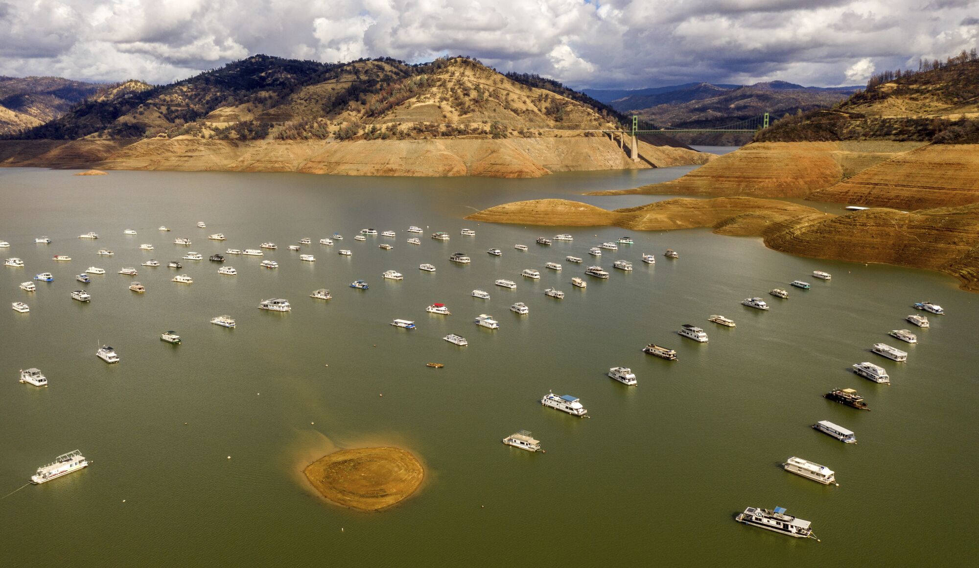Houseboats float on Lake Oroville in Oroville, Calif. 