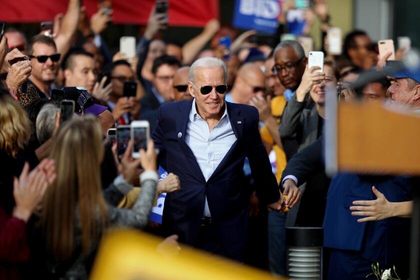 LOS ANGELES, CALIF. -- THURSDAY, NOVEMBER 14, 2019: Former Vice President Joe Biden makes his way to the podium to speak at Los Angeles Trade Technical College in Los Angeles, Calif., on Nov. 14, 2019. (Gary Coronado / Los Angeles Times)