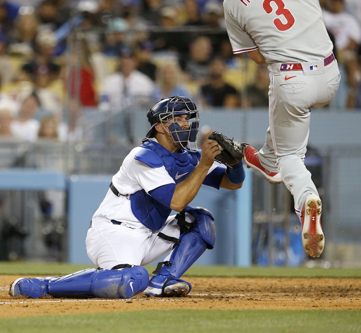  Dodgers catcher Austin Barnes  tags out Phillies  Bryce Harper in the sixth inning.