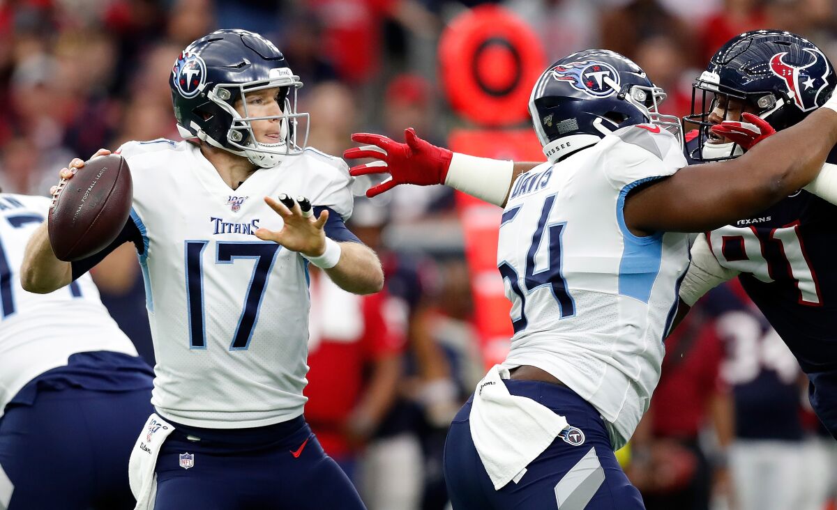 Quarterback Ryan Tannehill has blossomed in Tennessee and could lead the Titans to a playoff win Saturday in New England.