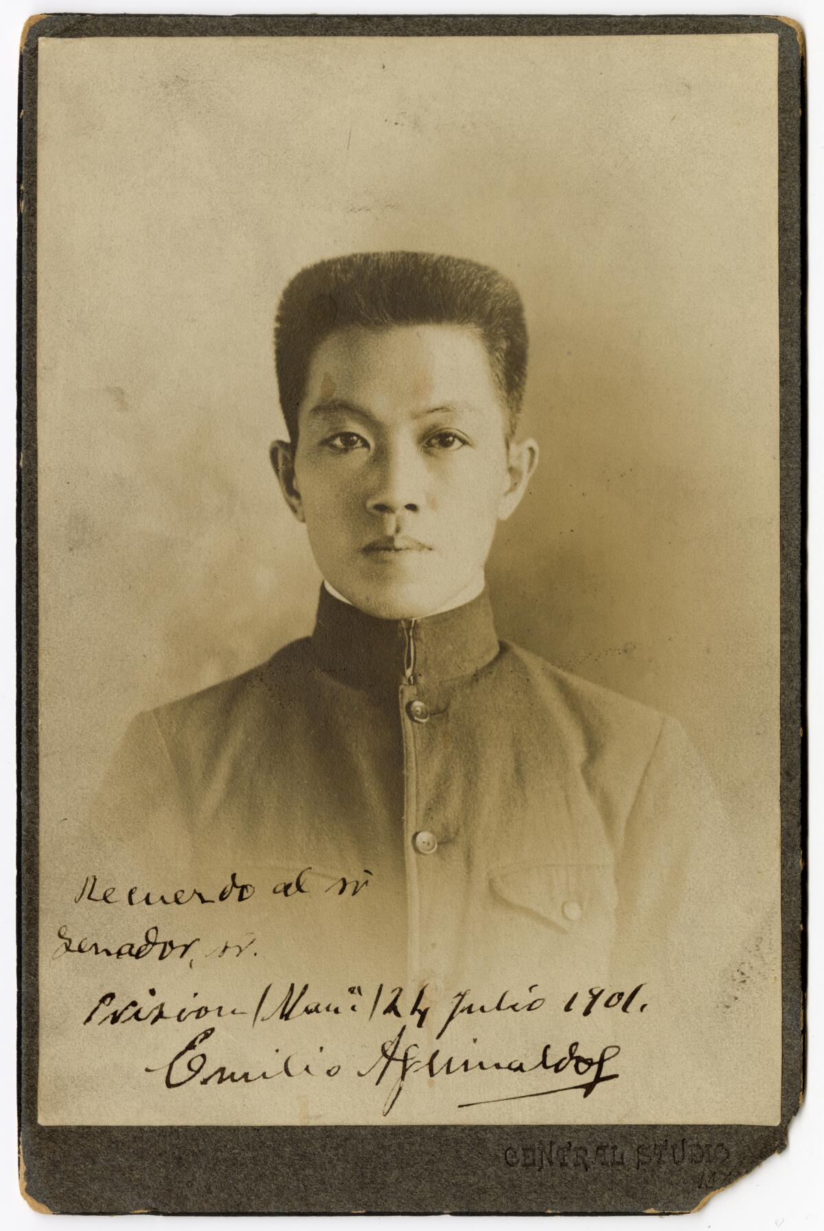 A vintage portrait of a youthful Emilio Aguinaldo, a Filipino independence leader in military-style shirt