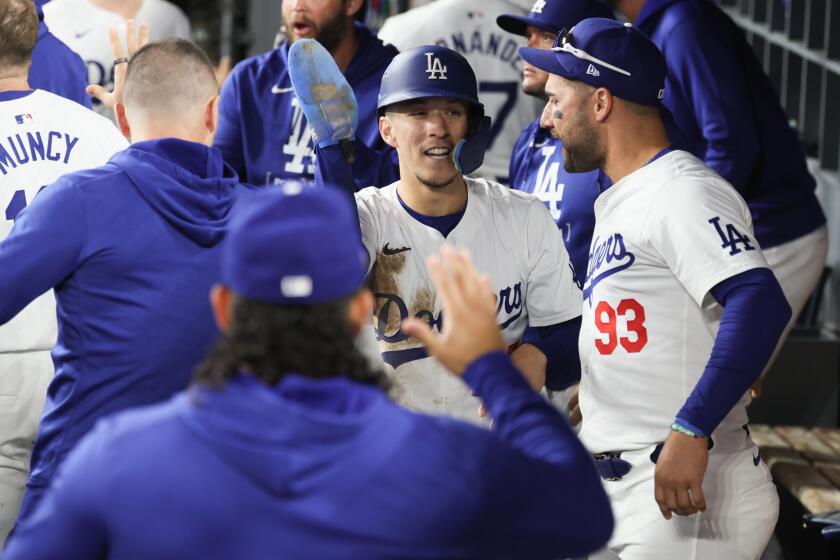 oLOS ANGELES, CALIFORNIA - OCTOBER 13: Tommy Edman #25 of the Los Angeles Dodgers celebrates.