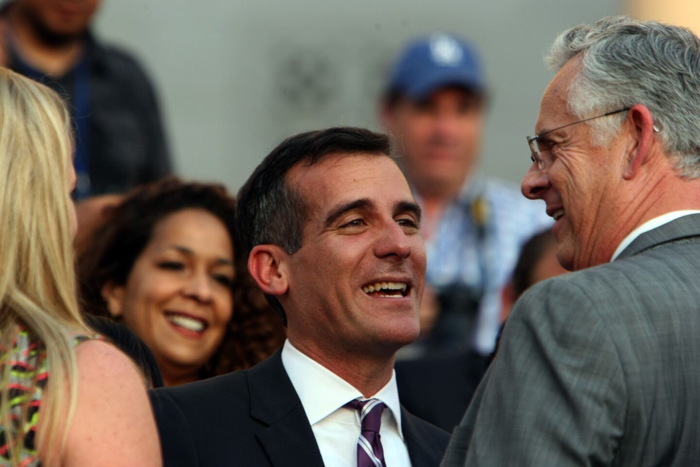 Eric Garcetti chats with former L.A. Mayor James Hahn. "You are the mayor of a world-class city, and you are going to be on the world stage," Hahn told him. "But I think the people who live here want somebody who's going to take care of fixing the streets and making sure that the city is safe."