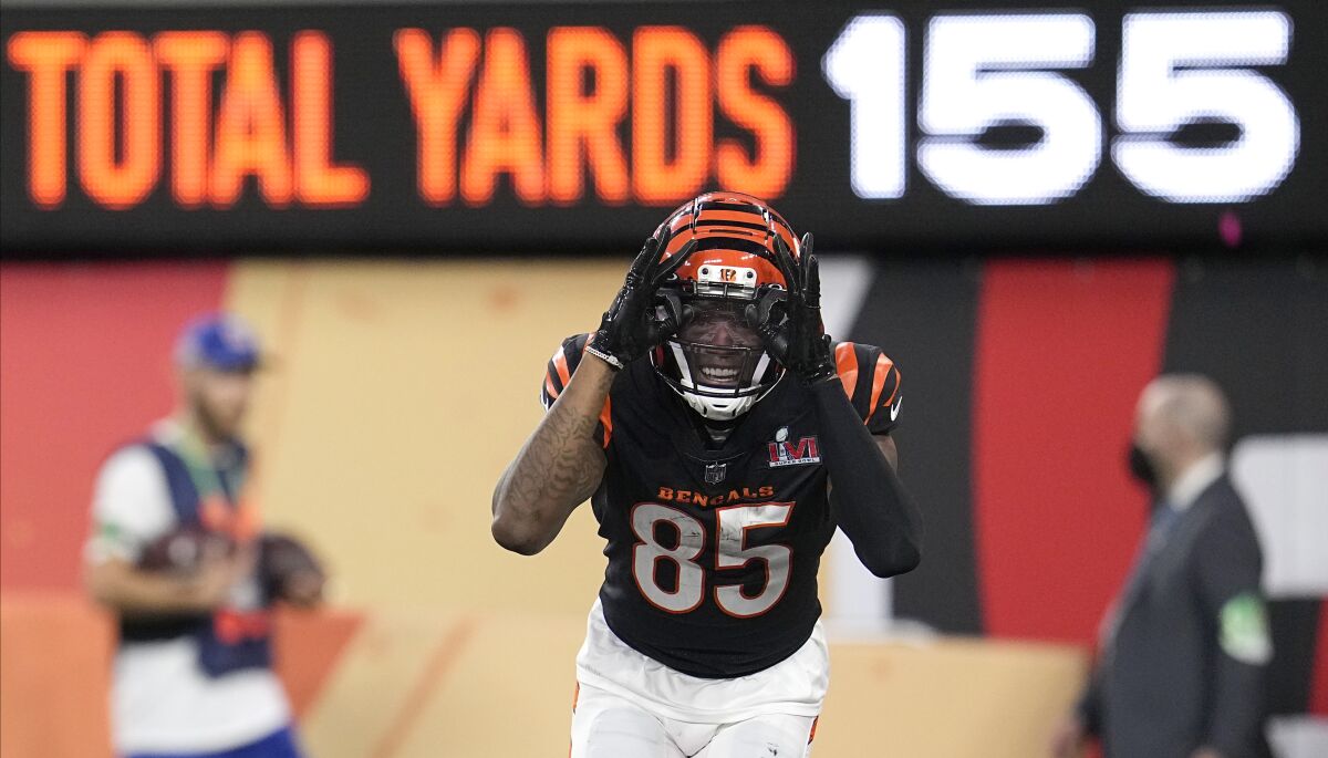 Cincinnati Bengals wide receiver Tee Higgins (85) reacts after scoring a touchdown against the Los Angeles Rams during the second half of the NFL Super Bowl 56 football game Sunday, Feb. 13, 2022, in Inglewood, Calif. (AP Photo/Marcio Jose Sanchez)