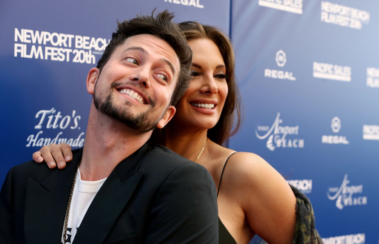 Jackson Rathbone and Alex Meneses pose for photographers at the Newport Beach Film Festival opening night Thursday.