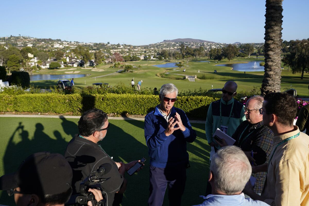 Philadelphia Phillies president of baseball operations Dave Dombrowski, center right, talks with reporters during Major League Baseball's general manager meetings, Wednesday, Nov. 10, 2021, in Carlsbad, Calif. (AP Photo/Gregory Bull)