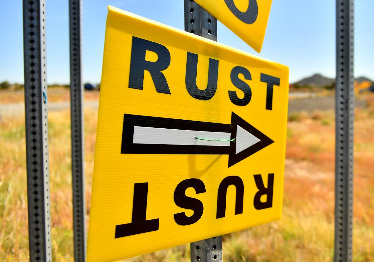 A sign directs people to the road that leads to the Bonanza Creek Ranch where the movie "Rust" was being filmed.