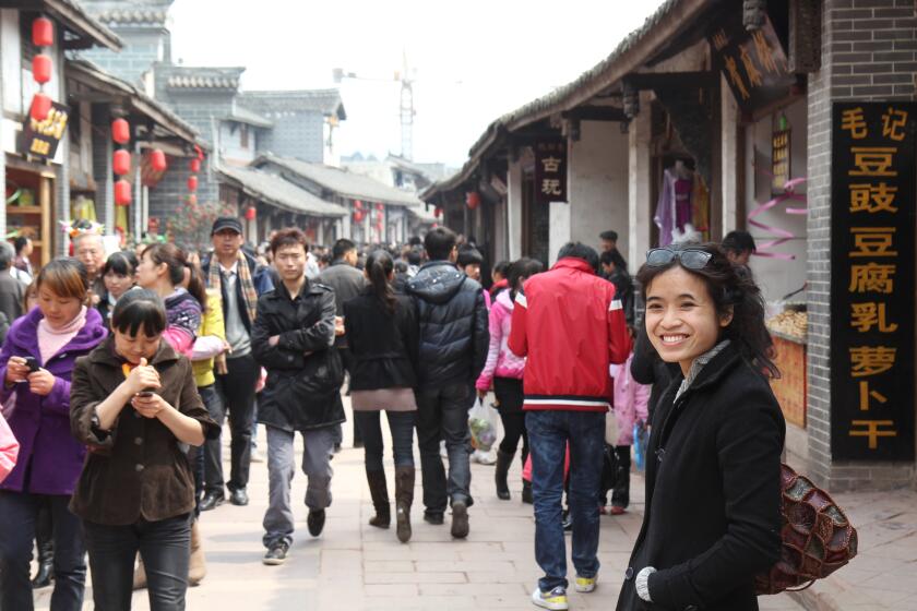 Author Te-Ping Chen's debut novel is "Land of Big Numbers". She is pictured in Chengdu in 2011.