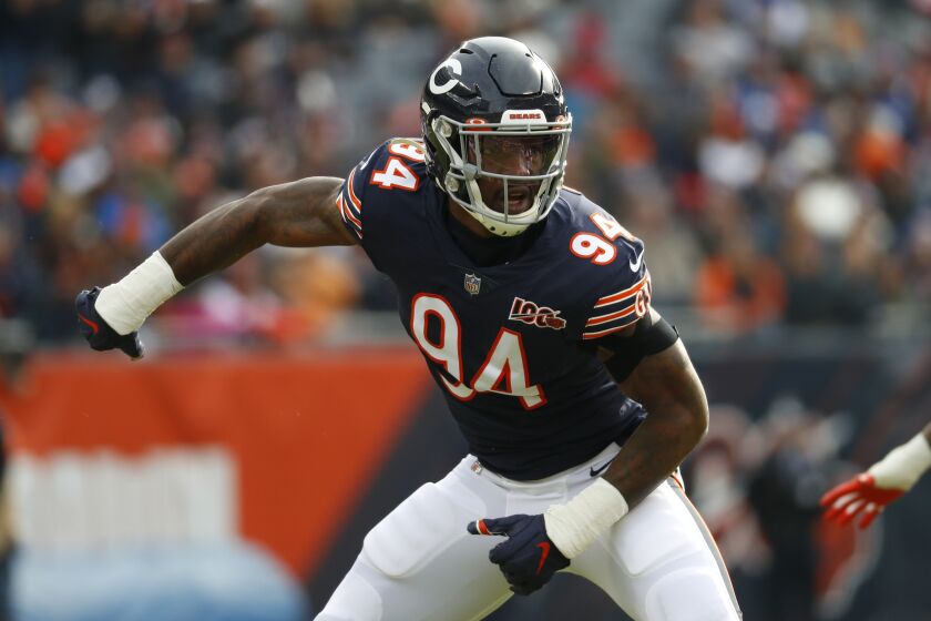FILE - In this Nov. 24, 2019, file photo, Chicago Bears outside linebacker Leonard Floyd plays against the New York Giants during the first half of an NFL football game in Chicago. A person with knowledge of the situation confirmed that the Los Angeles Rams agreed to a one-year deal worth up to $13 million for pass-rushing linebacker Floyd. He will be the nominal replacement for Dante Fowler, who joined an exodus of defensive starters from Los Angeles. (AP Photo/Paul Sancya, File)