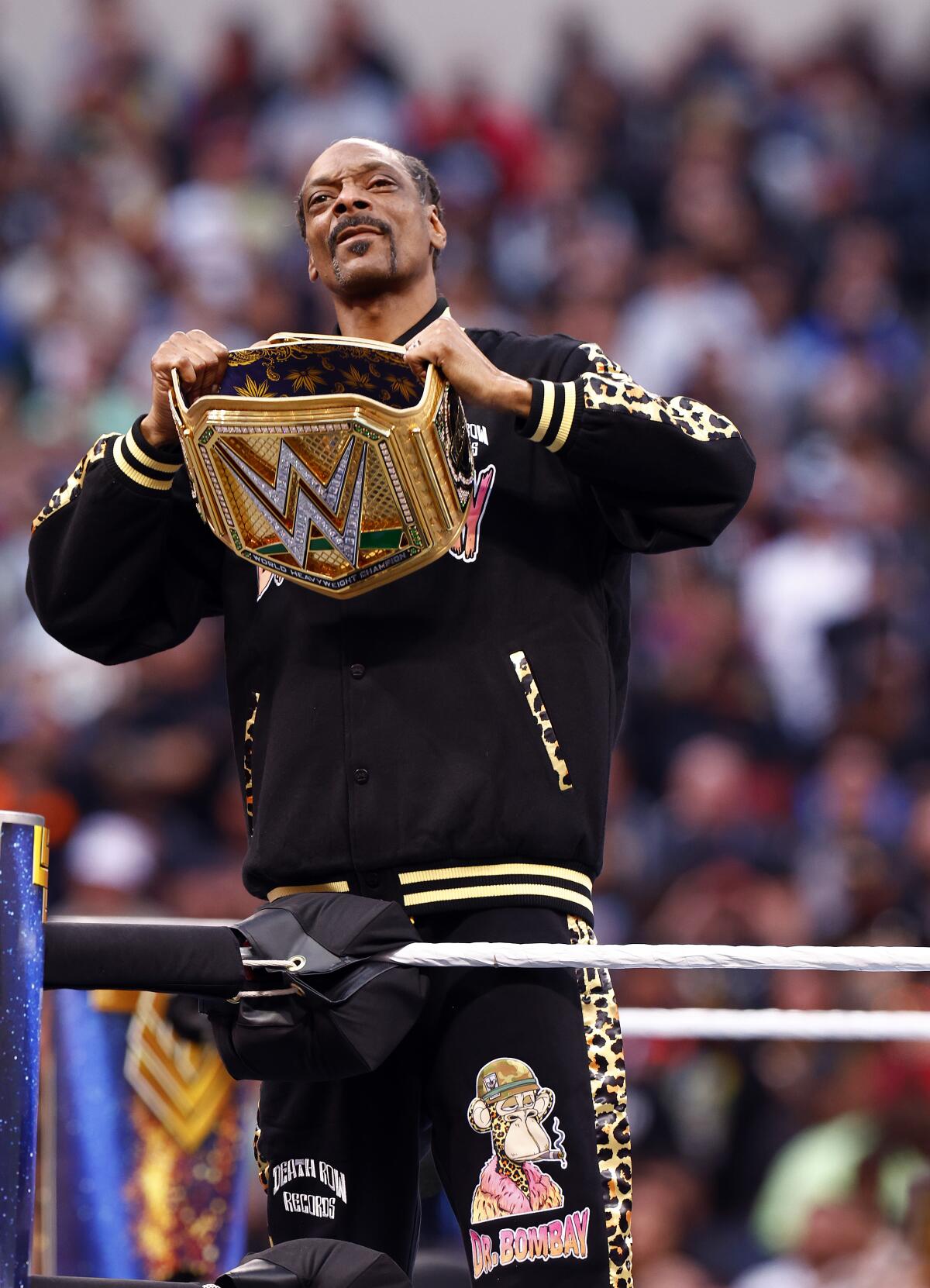 Snoop Dogg after beating up The Miz at WrestleMania following an apparent injury to Shane McMahon.