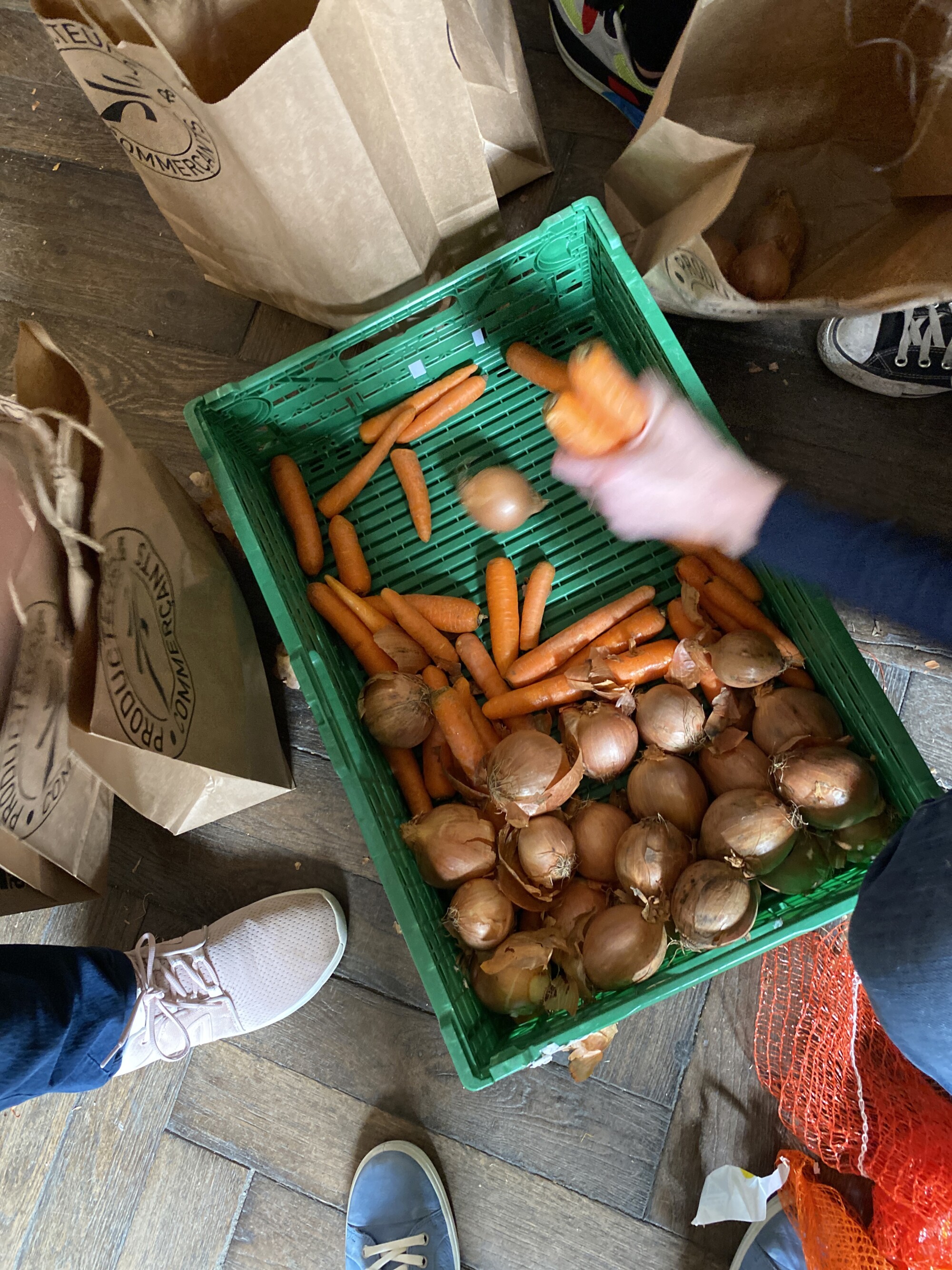 Volunteers prepare food donations.