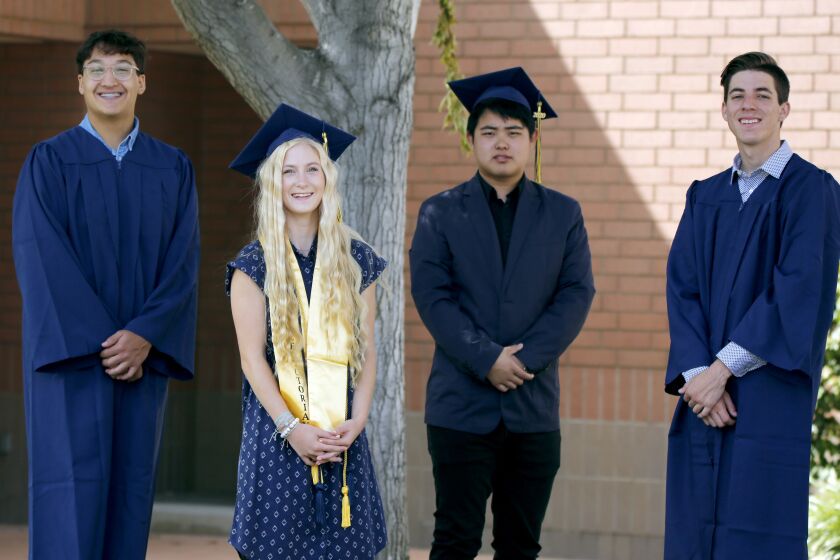 Newport Christian School graduating seniors are, from left, Lucas Hernandez, 18 of Tustin, Ashlyn Thompson, 18 of Lake Forest, Chang Yao (Tommy), 19 from Irvine and Matthew Bowman, 19 of Mission Viejo, on campus at the school in Newport Beach on Saturday, June 13, 2020. The students will have their graduation in July.